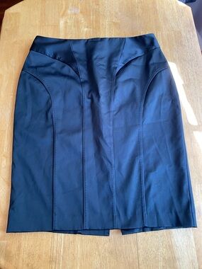 Black color by WAREHOUSE brand skirt size 8 in very good condition